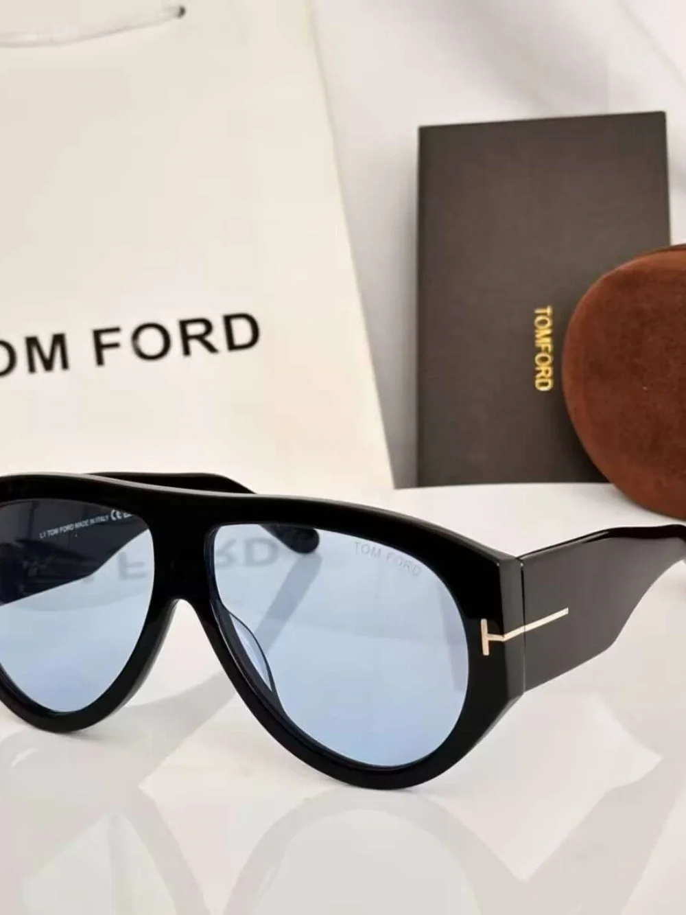 Tom Ford silver tom emblem
